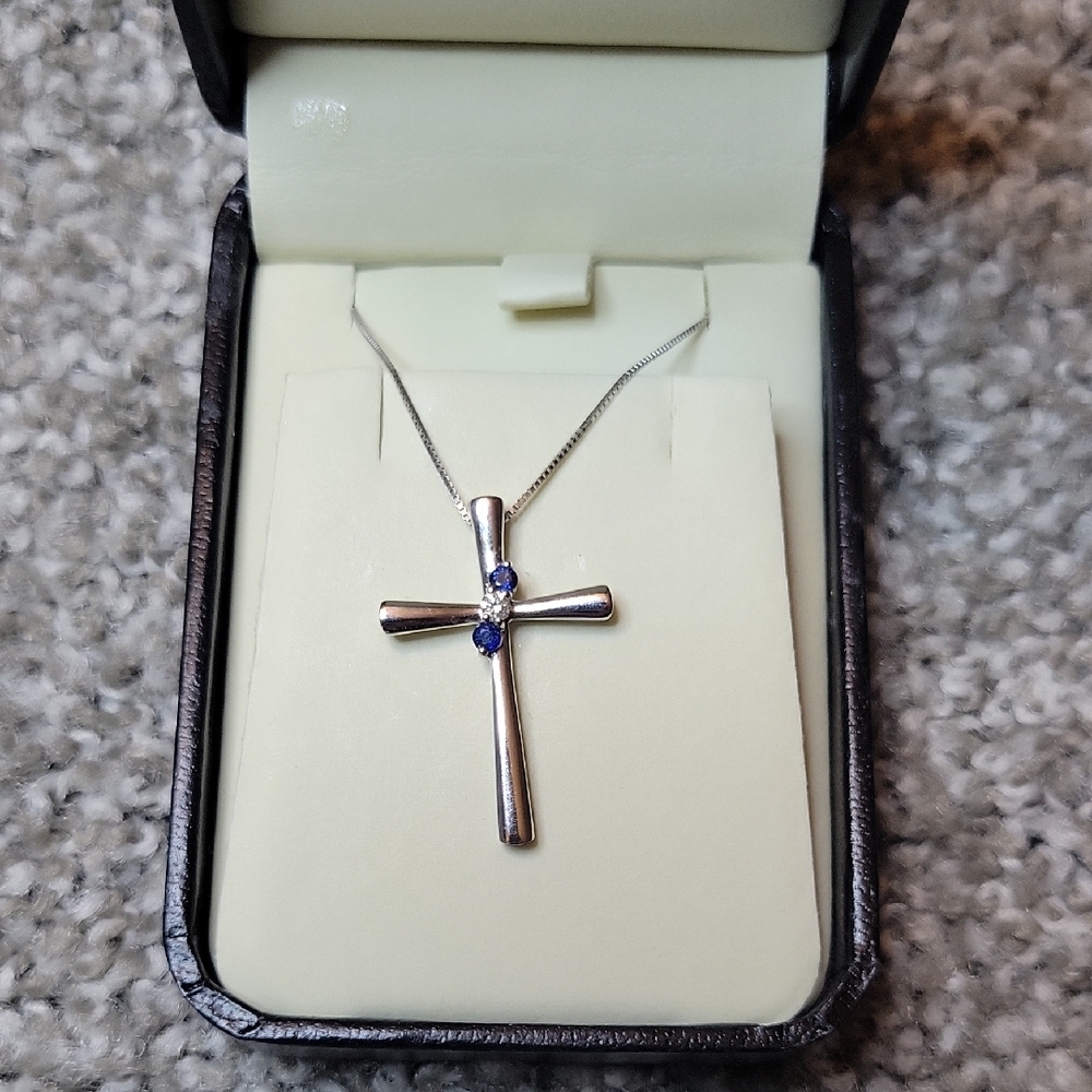 Elegant Silver Cross Necklace with Blue Accents